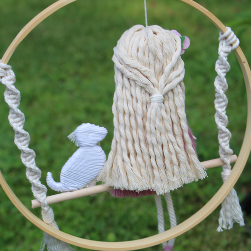 macrame doll with dog