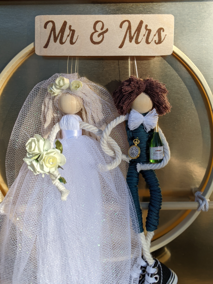 Macrame bride and groom in frame with personalized names engraved